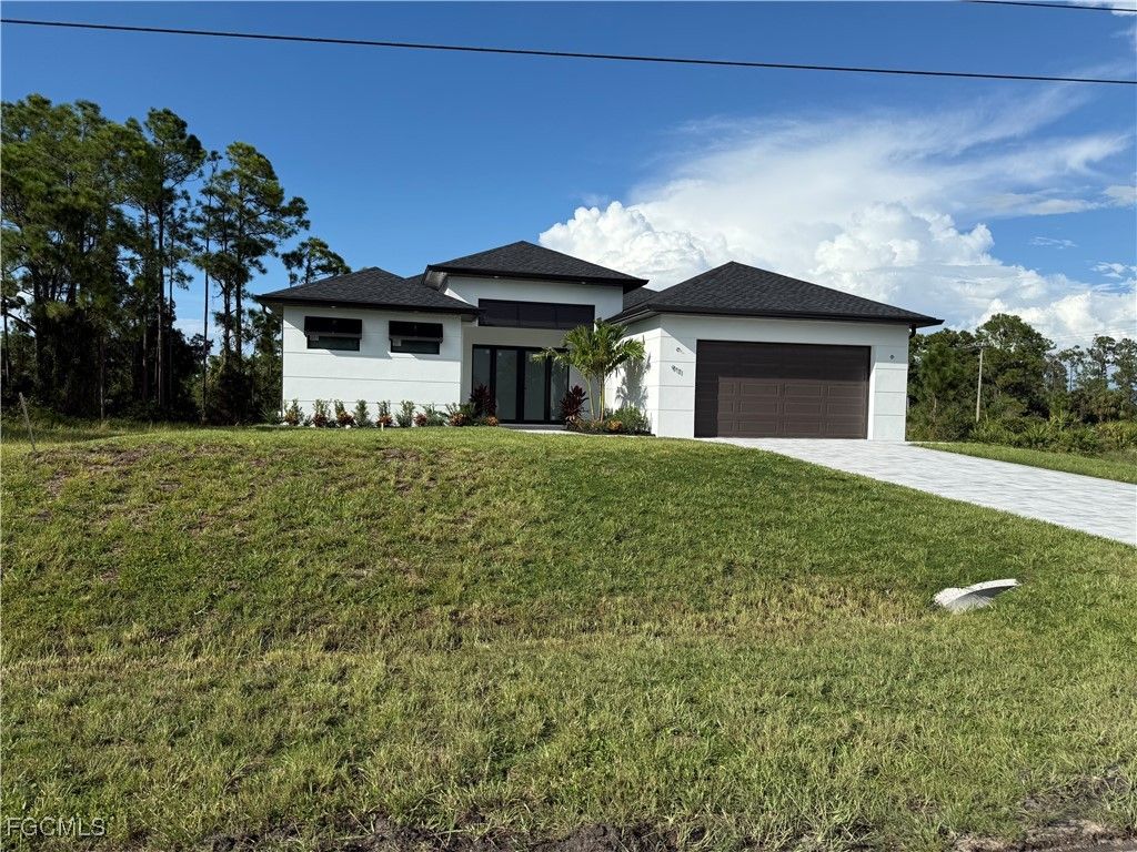 911 Asher ST E, Lehigh Acres, FL 33974