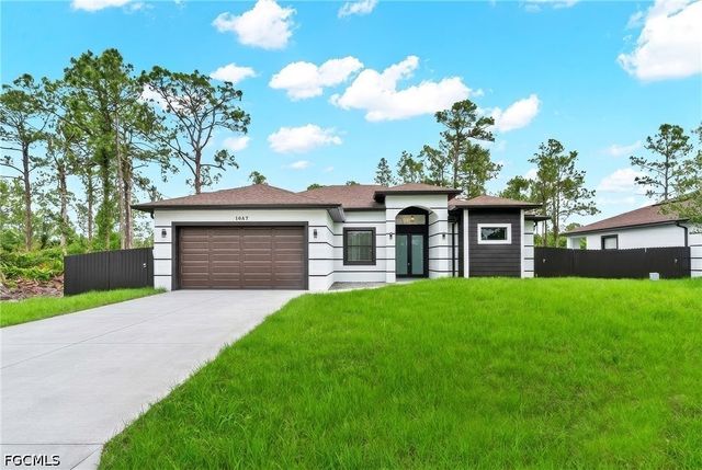 1047 Merry ST E, Lehigh Acres, FL 33974
