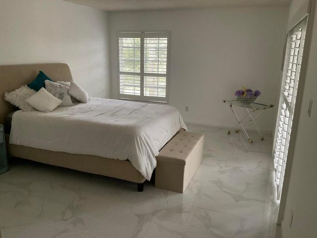 7370 Orangewood Lane 303, Boca Raton, FL 33433