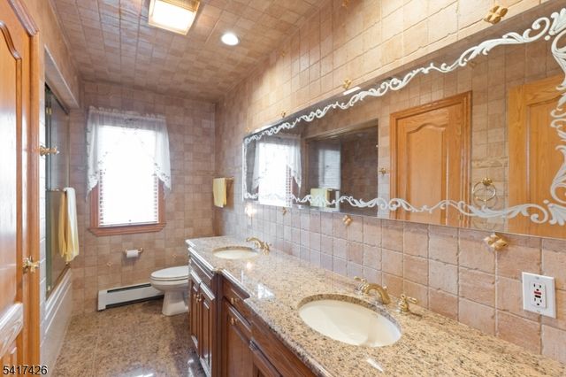 512 Van Bussum Ave, Garfield City, NJ 07026