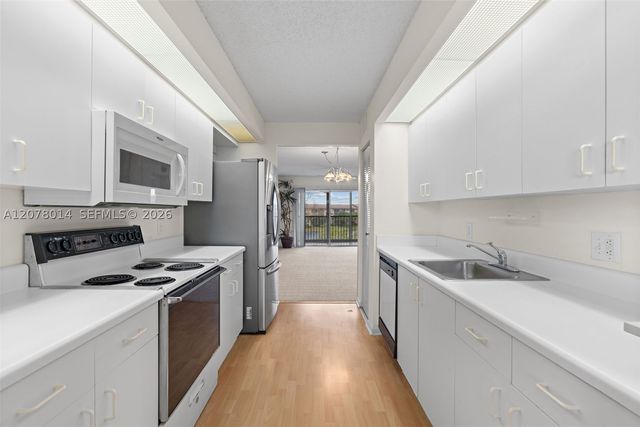 13705 SW 12th St 409B, Pembroke Pines, FL 33027
