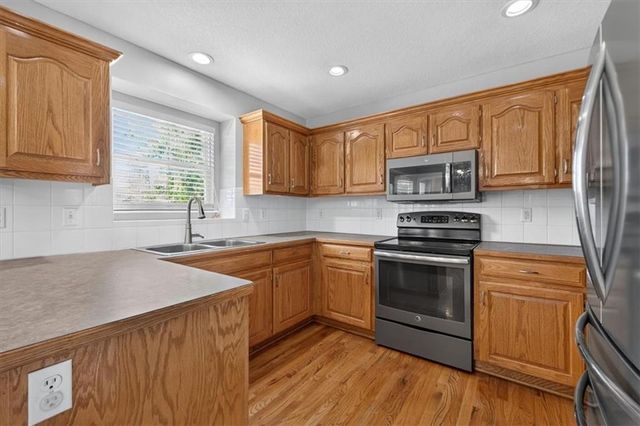 1109 White Oak Court, Raymore, MO 64083