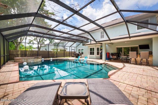 7765 BLACKSTONE RIVER Drive E, Jacksonville, FL 32256