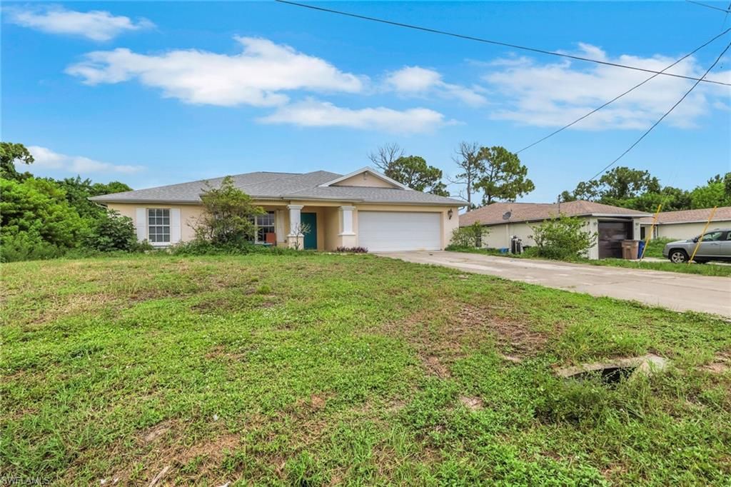 277 Grant BLVD, LEHIGH ACRES, FL 33974 — exterior