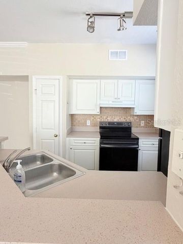 9108 LAKE CHASE ISLAND WAY 9108, Tampa, FL 33626