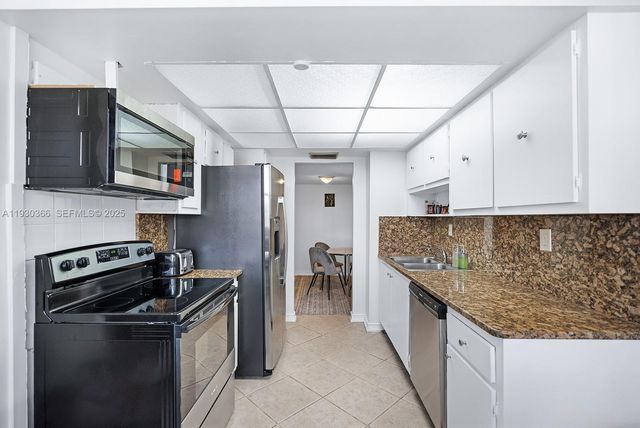 100 Golden Isles Dr 101, Hallandale Beach, FL 33009