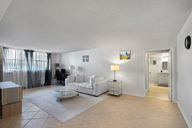 100 Golden Isles Dr 101, Hallandale Beach, FL 33009