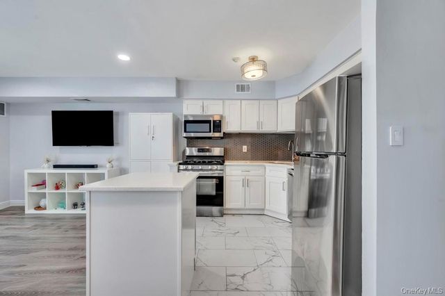 348 Artist Lake Drive, Middle Island, NY 11953