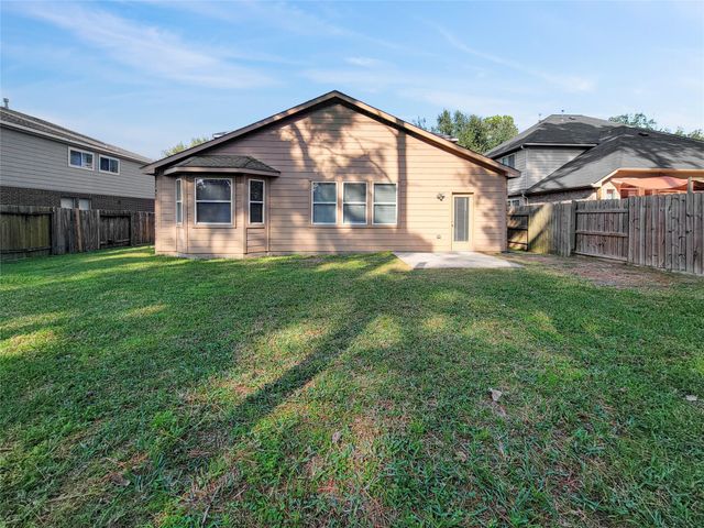 8822 Rolling Rapids Road, Humble, TX 77346