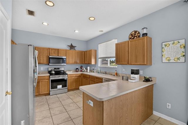 4951 WHISTLING PINES COURT, Wesley Chapel, FL 33545