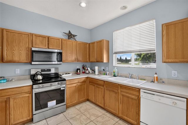 4951 WHISTLING PINES COURT, Wesley Chapel, FL 33545