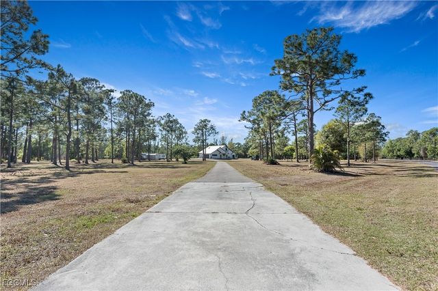 12751 Palmetto Pines DR, Cape Coral, FL 33909