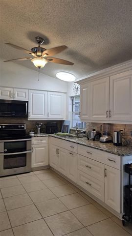 4912 E SERENA DRIVE, Tampa, FL 33617