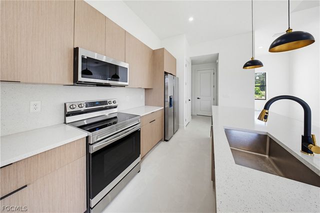 1202 Calvin AVE, Lehigh Acres, FL 33972