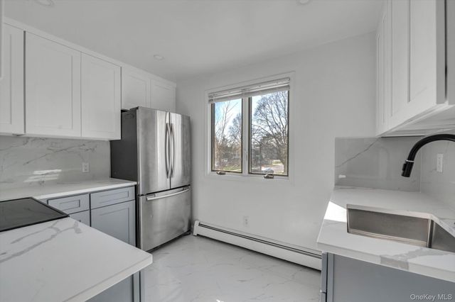 21 Bird Lane, Hicksville, NY 11801