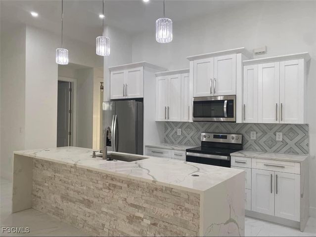 24 Chiquita BLVD S, Cape Coral, FL 33991