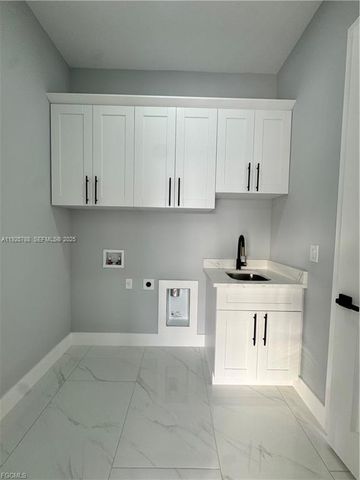 54 Tena Ave S, Lehigh Acres, FL 33976