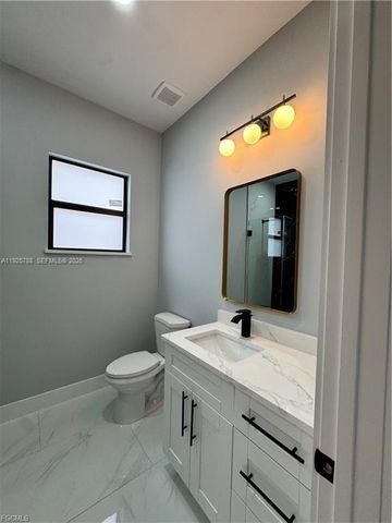 54 Tena Ave S, Lehigh Acres, FL 33976