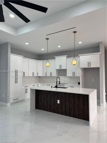 54 Tena Ave S, Lehigh Acres, FL 33976