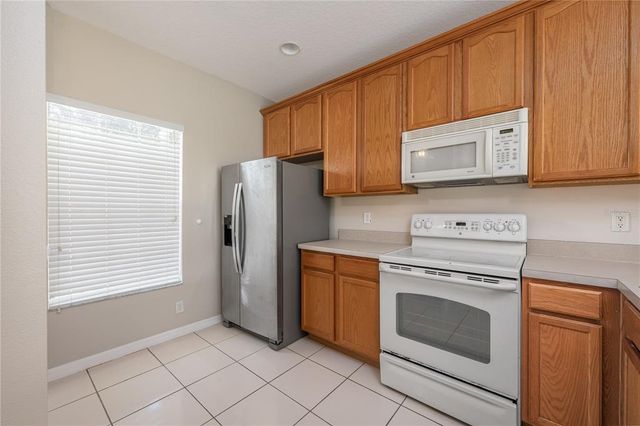 9441 FLOWERING COTTONWOOD ROAD 41, Orlando, FL 32832