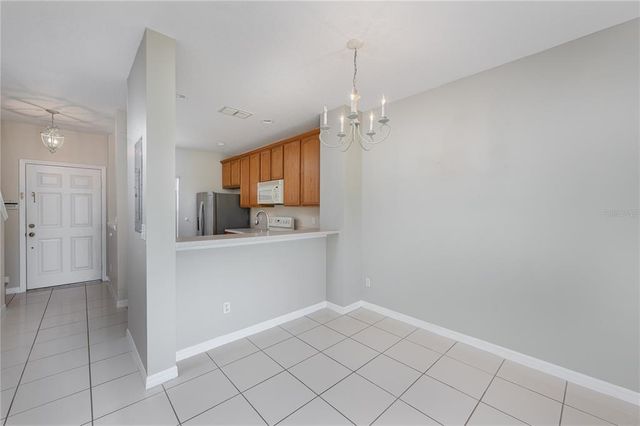 9441 FLOWERING COTTONWOOD ROAD 41, Orlando, FL 32832