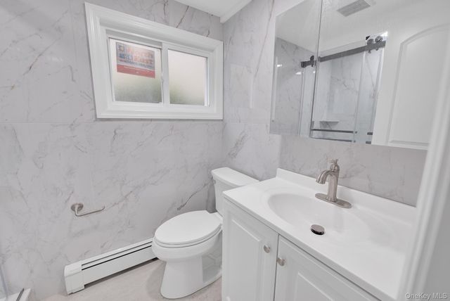 77 Roquette Avenue, Elmont, NY 11003