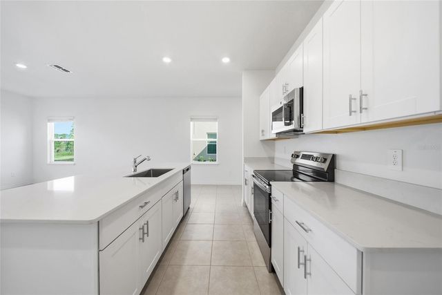 8879 COQUI SONG LANE, Land O Lakes, FL 34637