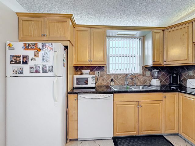 4930 E Sabal Palm Blvd 301, Tamarac, FL 33319