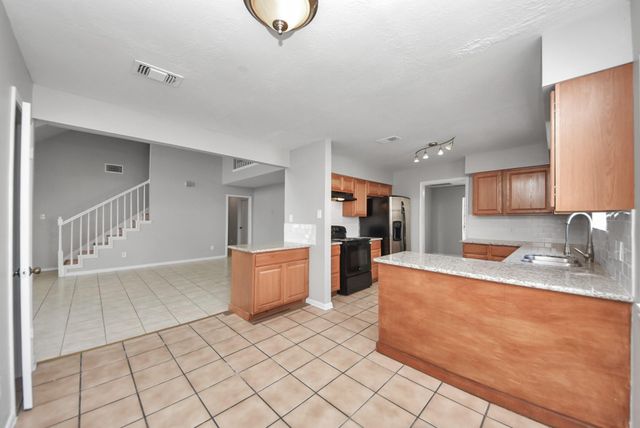 115 Squires Bend, Stafford, TX 77477