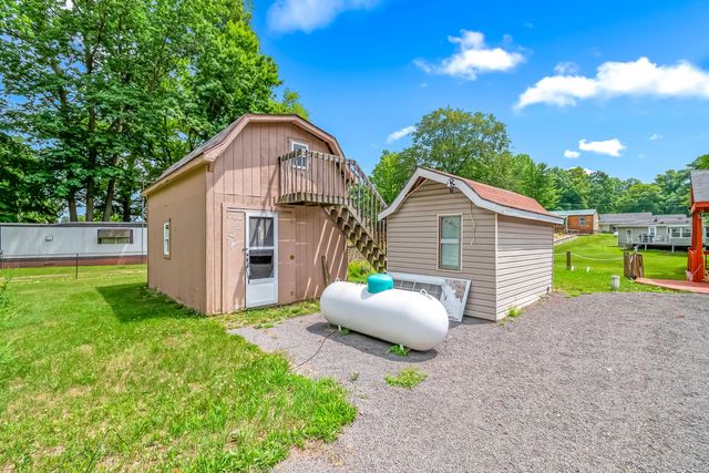 6915 Rowley Drive, Osseo, MI 49266