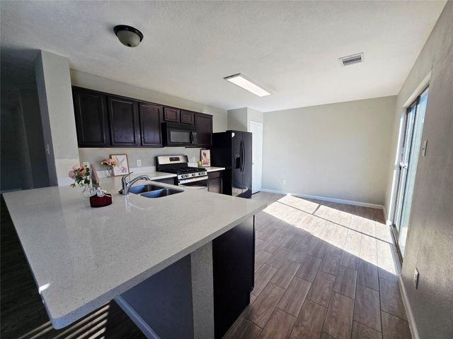 1011 Larks Trace Lane, Houston, TX 77090