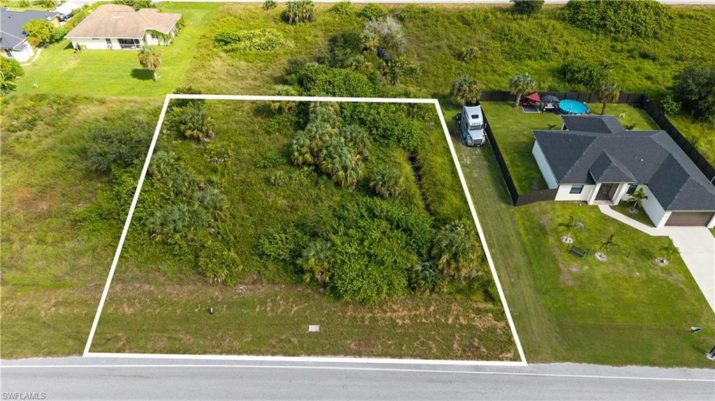 819 Milwaukee BLVD, LEHIGH ACRES, FL 33974 — exterior
