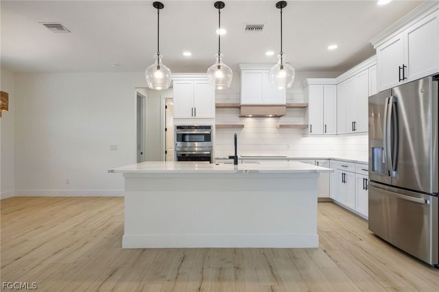 1406 Mohawk PKWY, Cape Coral, FL 33914