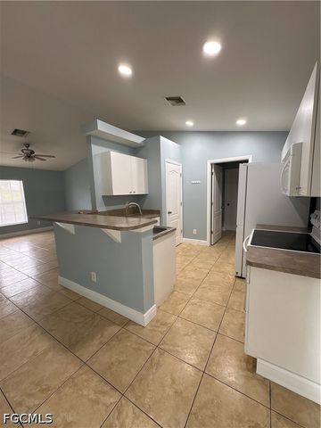 3004 3rd ST W, Lehigh Acres, FL 33971