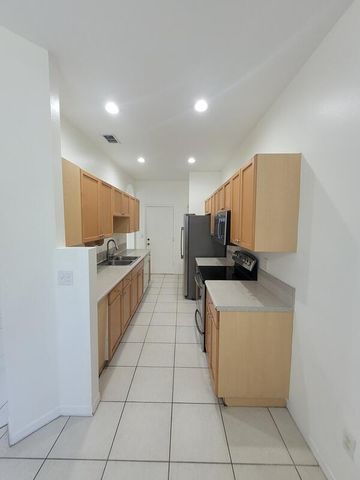 303 Seminole Palms Drive, Greenacres, FL 33463