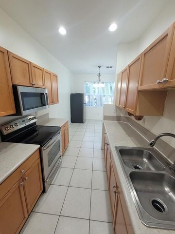 303 Seminole Palms Drive, Greenacres, FL 33463