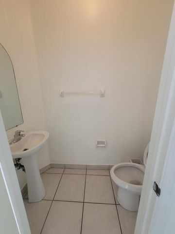 303 Seminole Palms Drive, Greenacres, FL 33463