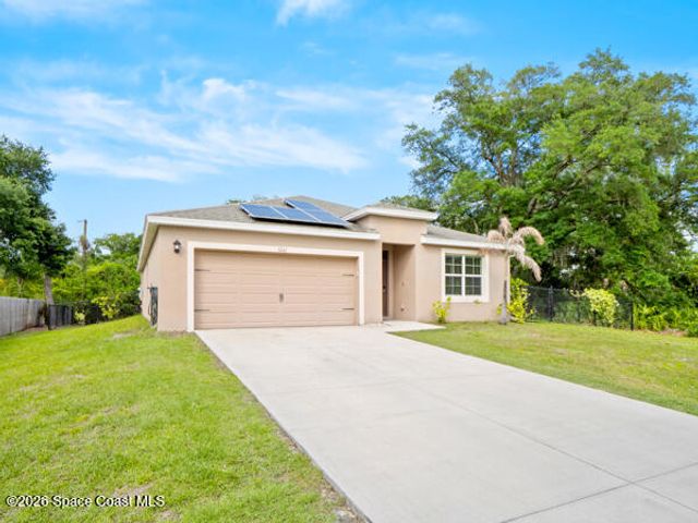 1261 Rainbow Road SE, Palm Bay, FL 32909