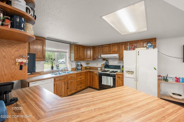 12259 W King Arthur Drive, & 12424 Looking Glass, Houston, AK 99694