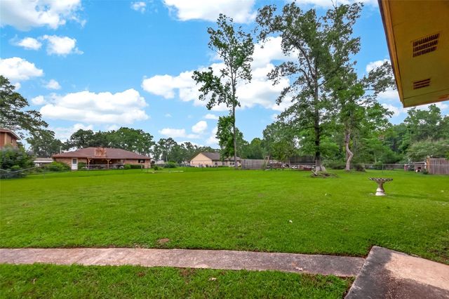 262 Magnolia Road, Woodbranch, TX 77357