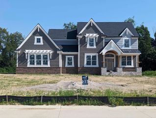 64111 Bur Oak Drive 19, Washington, MI 48095