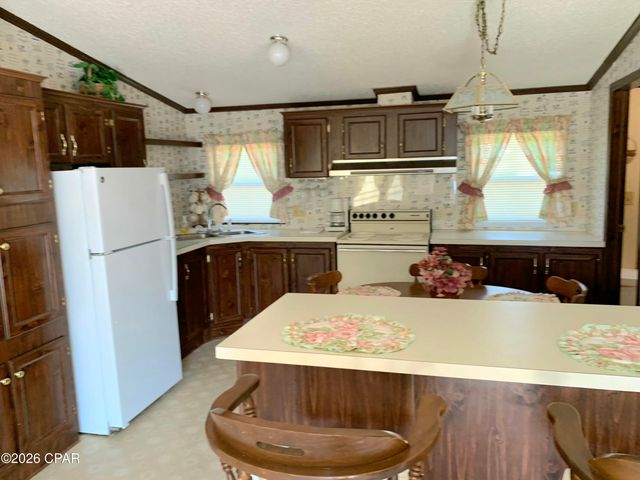 307 Carol Place, Panama City Beach, FL 32413