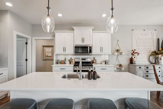 783 Sweet Wood Ln Lane, Blue Grass, IA 52726