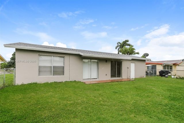 9749 Sandalfoot Boulevard, Boca Raton, FL 33428