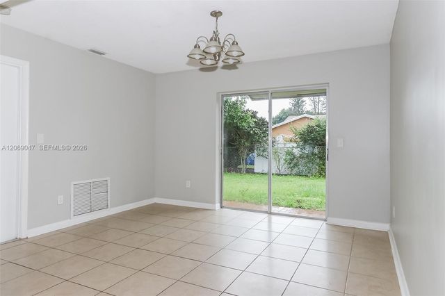 9749 Sandalfoot Boulevard, Boca Raton, FL 33428