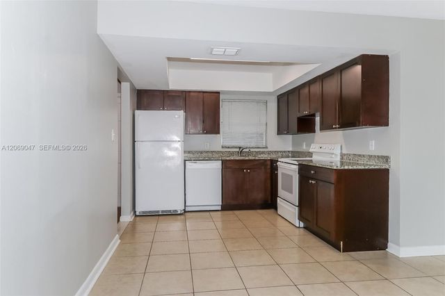9749 Sandalfoot Boulevard, Boca Raton, FL 33428