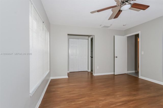 9749 Sandalfoot Boulevard, Boca Raton, FL 33428