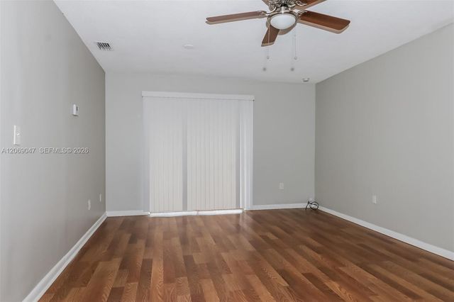9749 Sandalfoot Boulevard, Boca Raton, FL 33428