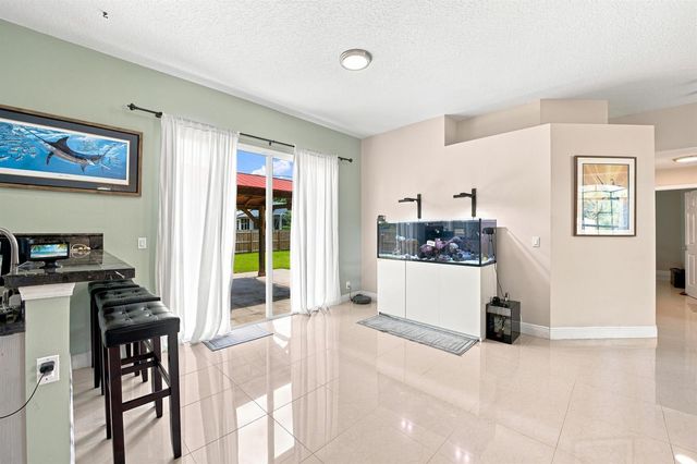 1526 SW MULLINAX Avenue, Port St. Lucie, FL 34953