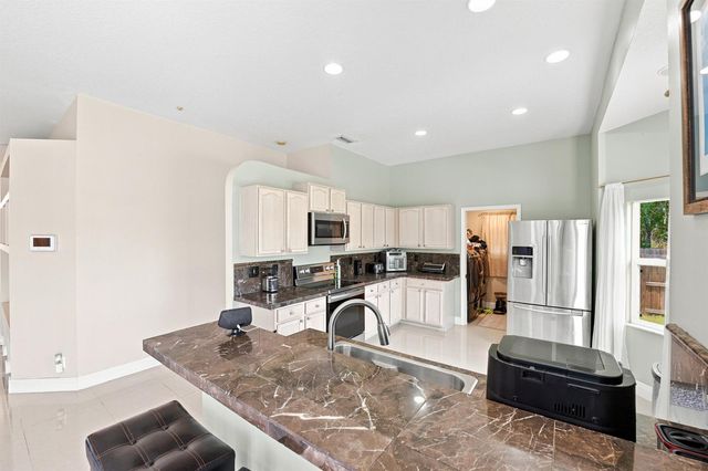 1526 SW MULLINAX Avenue, Port St. Lucie, FL 34953